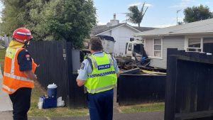 truck crashes into auckland houses